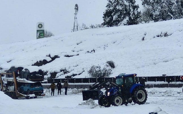 Farmers rally together to assist motorists stuck in heavy snowfall